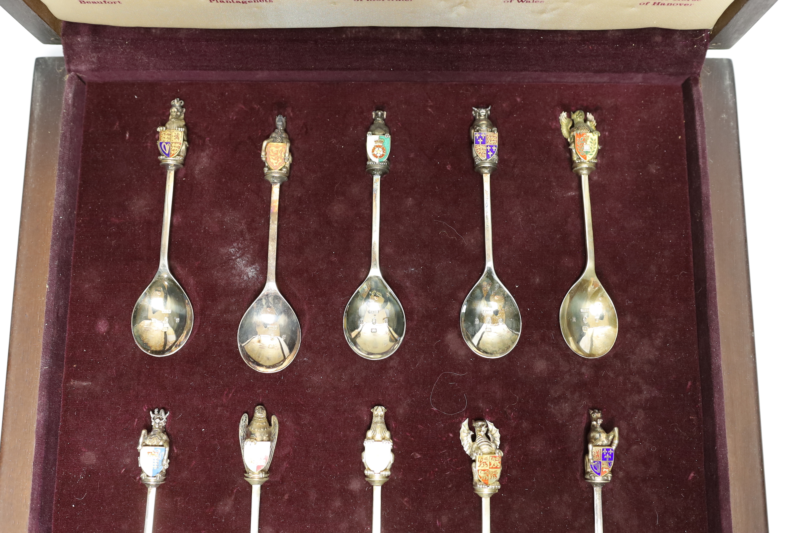 A Queen Elizabeth II Limited Edition cased set of ten 'The Queen's Beasts Collection' silver and enamel spoons, Toye, Kenning & Spencer, London, 1977, 14cm, numbered 929/2500.